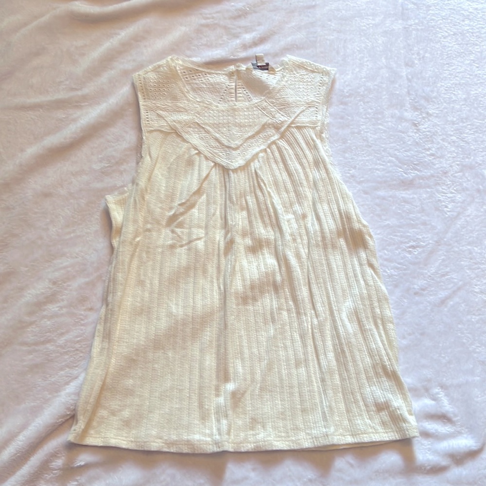 Sleeveless white top